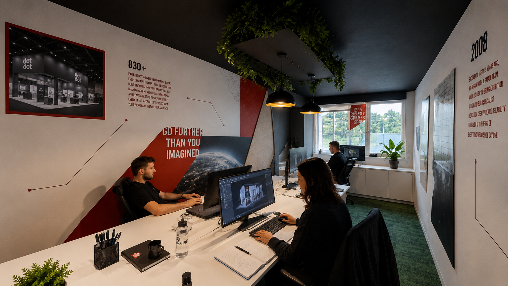 The Stand People design office with team members working on stand visuals